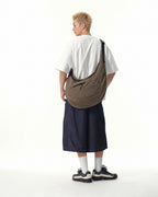 S26-C2-B / Offset Void Crescent Bag (Brown)