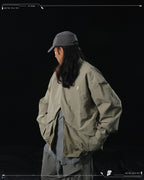 AW23 / 01 — T23-073  Trapezoidal Stereo Visor Shirt (Sand)