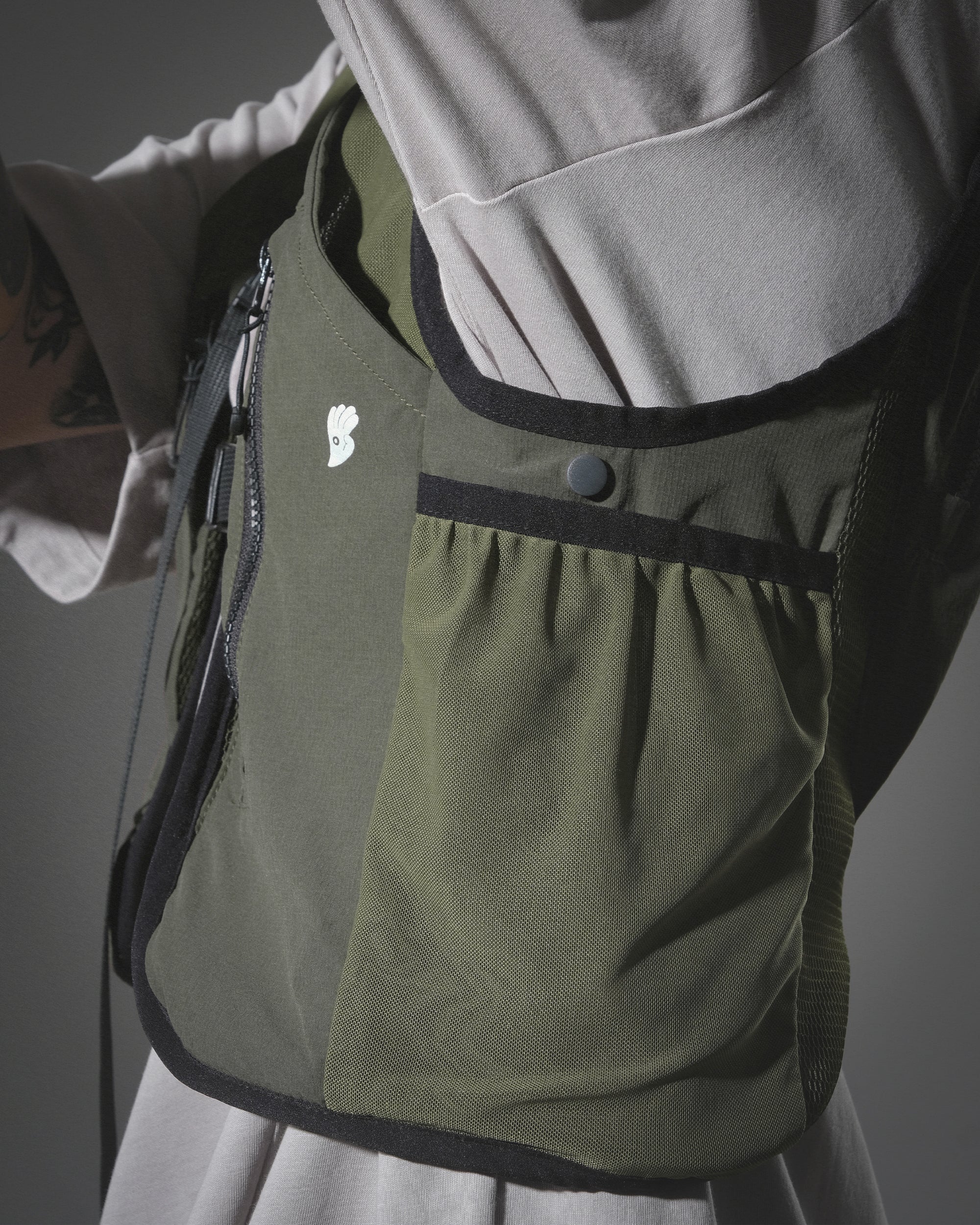 S24  / 18 —  O-03  Maneuverable Mighty Form Vest (Green)