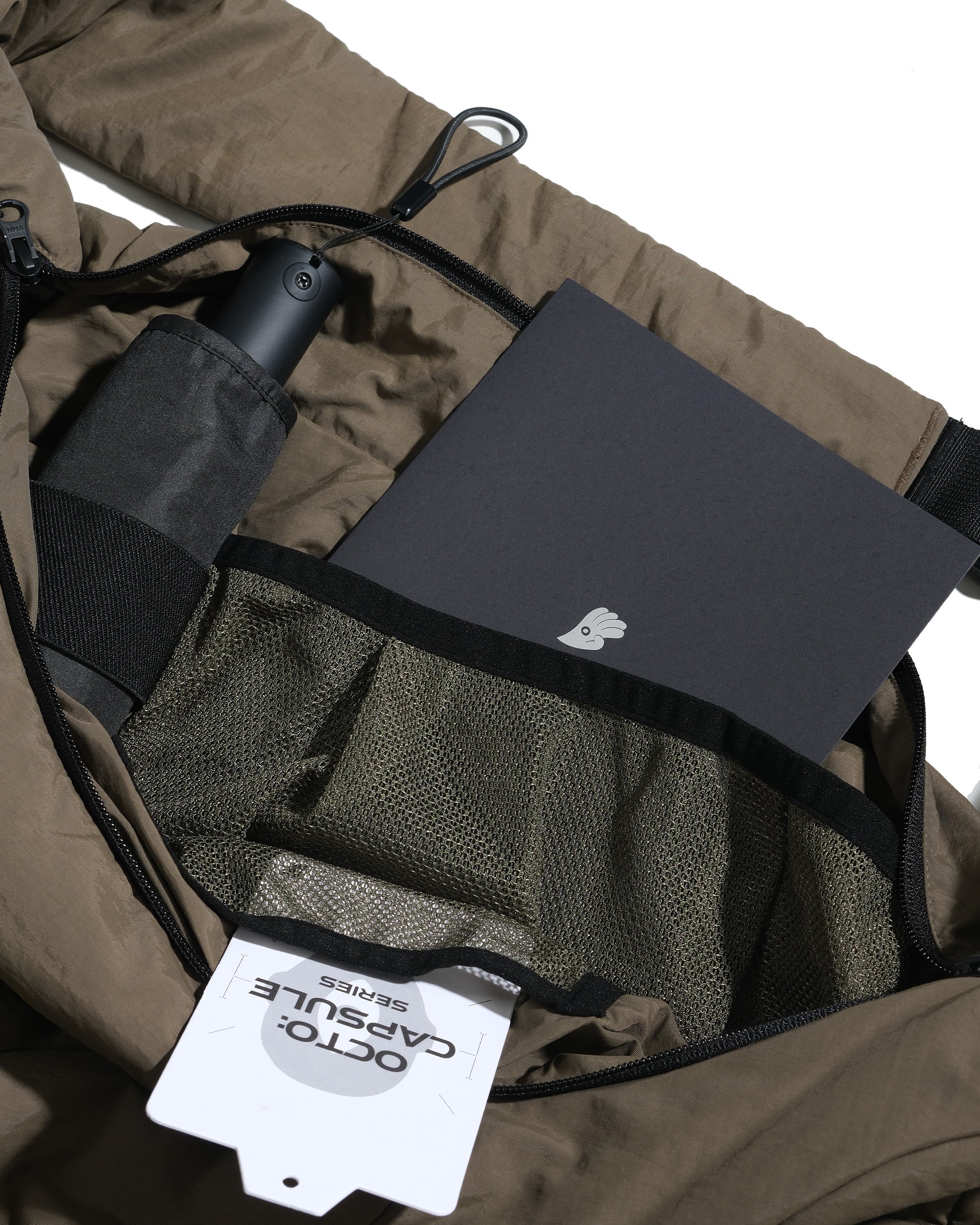 S26-C2-B / Offset Void Crescent Bag (Brown)