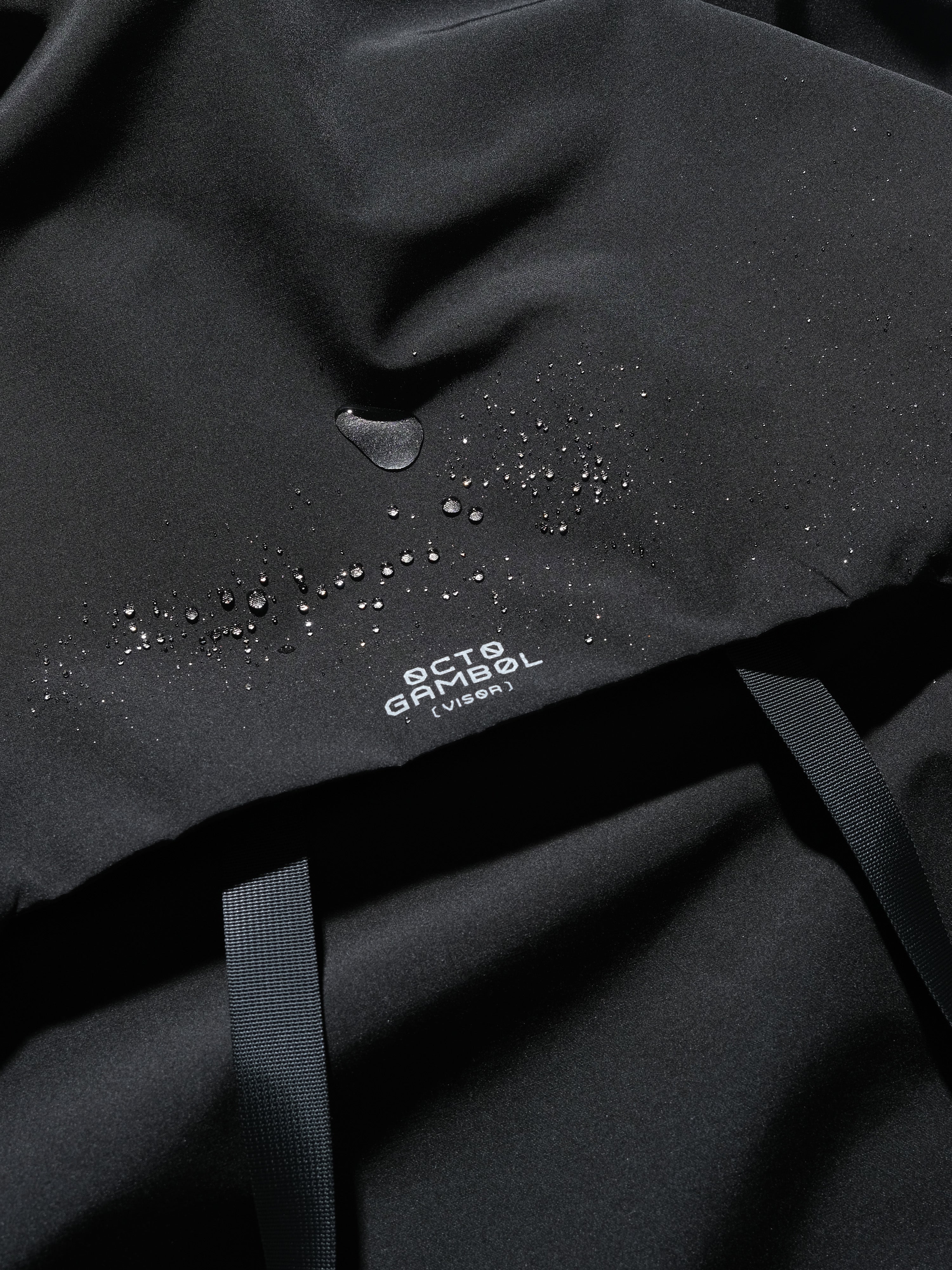 AW23 / 08 —J23-028  Radial Visor Windbreaker (Black)