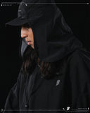 AW23 / 01 — T23-073  Trapezoidal Stereo Visor Shirt (Black)