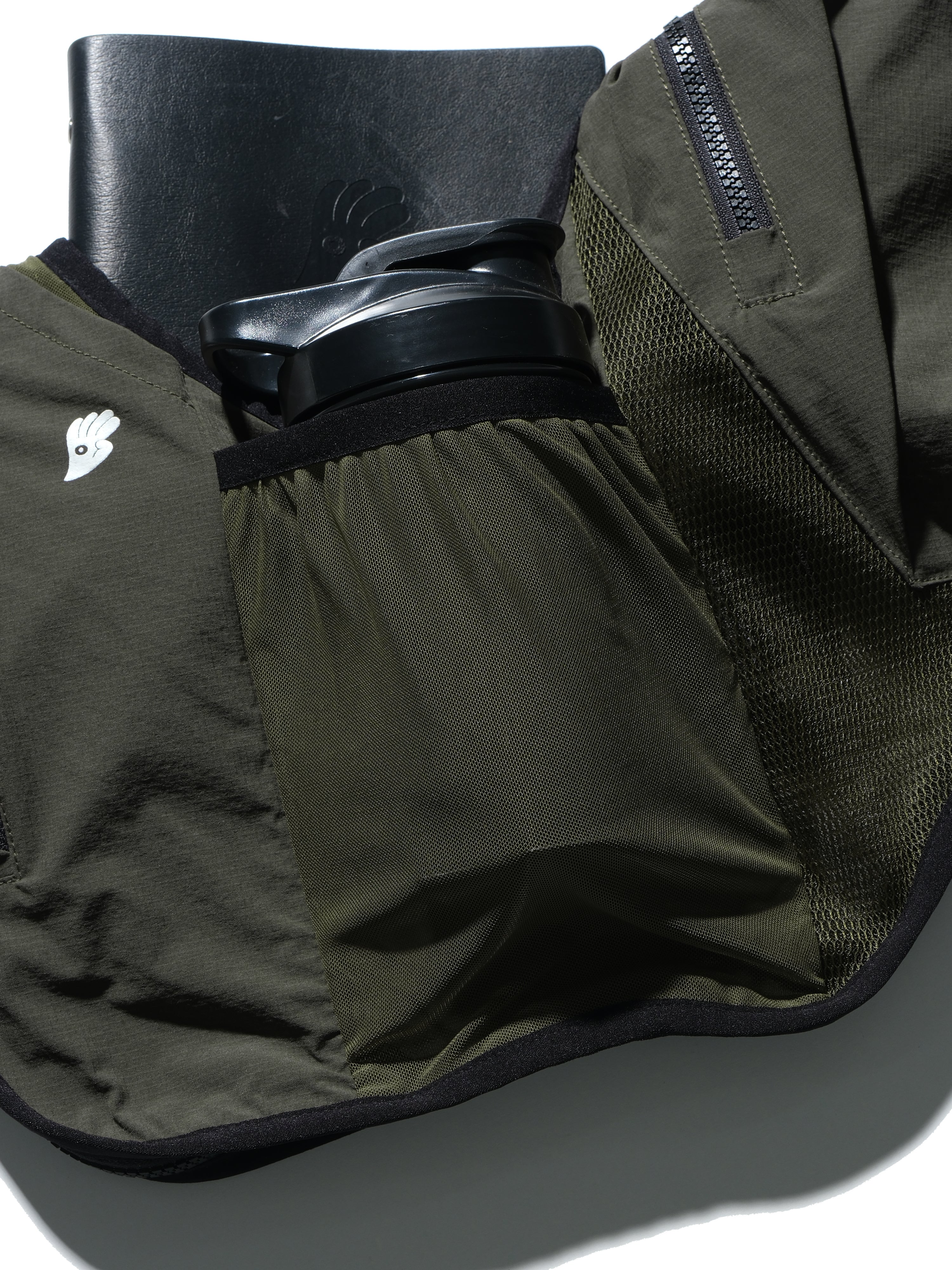 S24  / 18 —  O-03  Maneuverable Mighty Form Vest (Green)