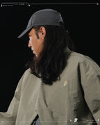 AW23 / 01 — T23-073  Trapezoidal Stereo Visor Shirt (Sand)