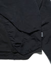 AW23 / 01 — T23-073  Trapezoidal Stereo Visor Shirt (Black)
