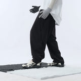 Capsule 01 / CSP-116 Hidden Pocket Adjustable Loose Pants  (Black)