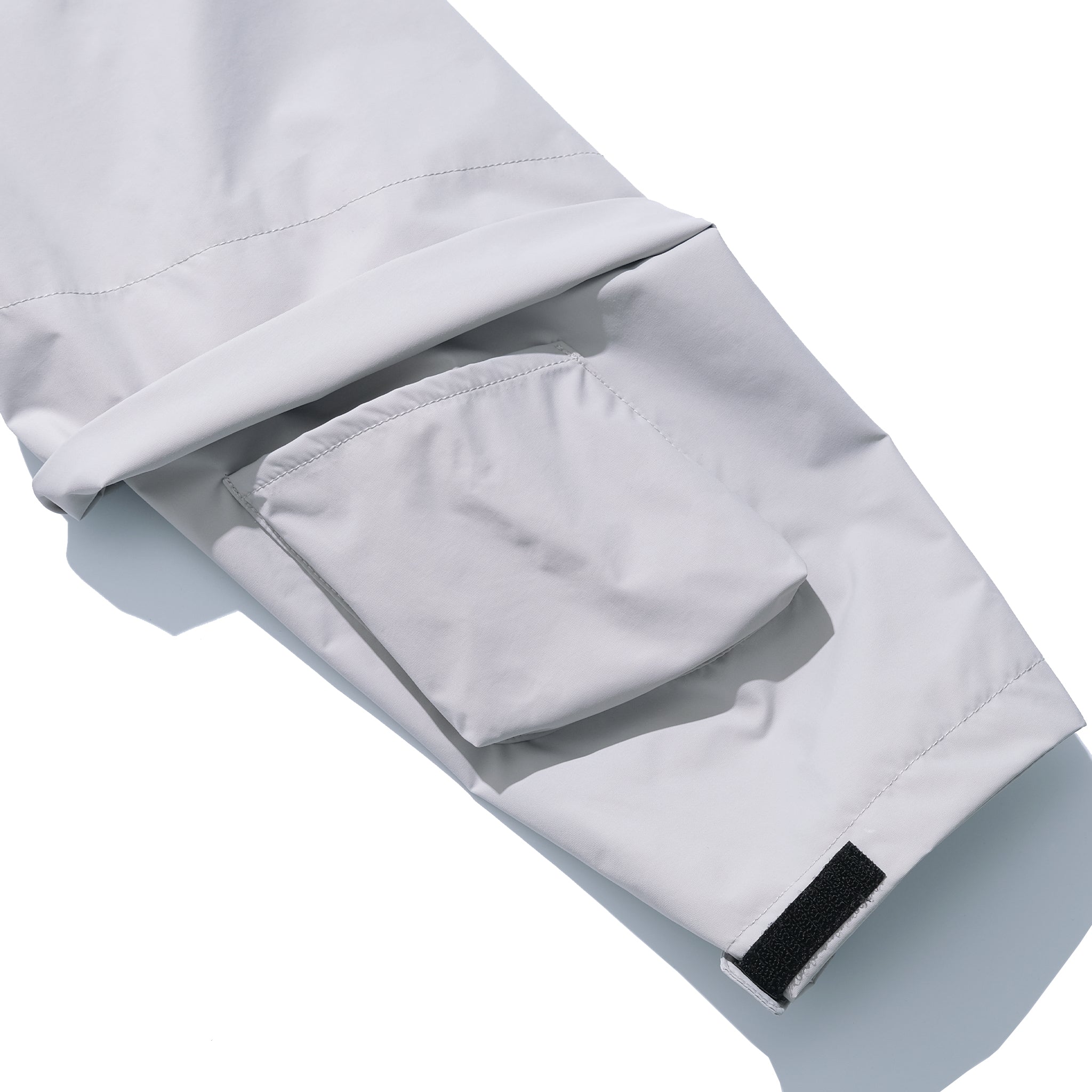 AW22 / 03 — J22-022 Expandable Crossbag Windbreaker (Ivory Grey)